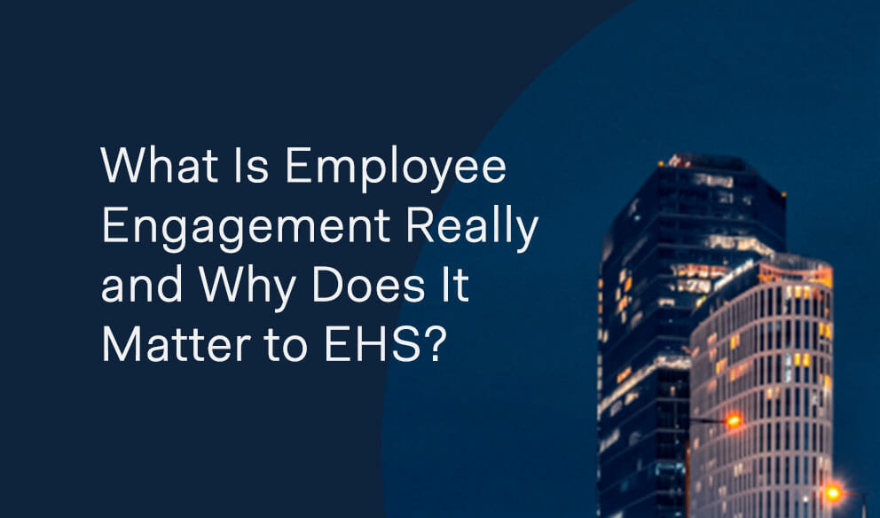 Text reads What Is Employee Engagement Really and Why Does It Matter to EHS? with buildings in the background, exploring what employee engagement means and its impact on EHS programs.