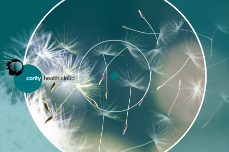 Dandelion seeds float with white circular patterns and Cority Health Cloud text on a teal background, highlighting workplace wellness and seasonal flu awareness.