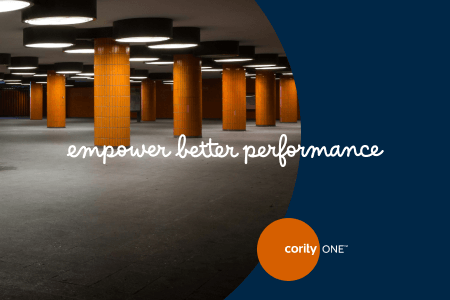 Underground space with orange columns and text: empower better performance, highlighting EHS Excellence. Cority ONE logo in corner.