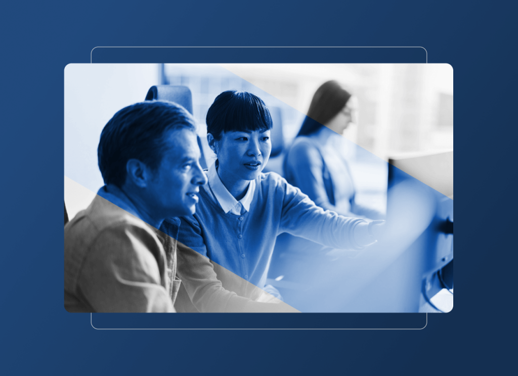 Two people sit at a computer, collaborating and looking at the screen, with another person working in the background. The image features a blue overlay and a modern, digital frame—perfect for presentations about teamwork in the hospital industry.