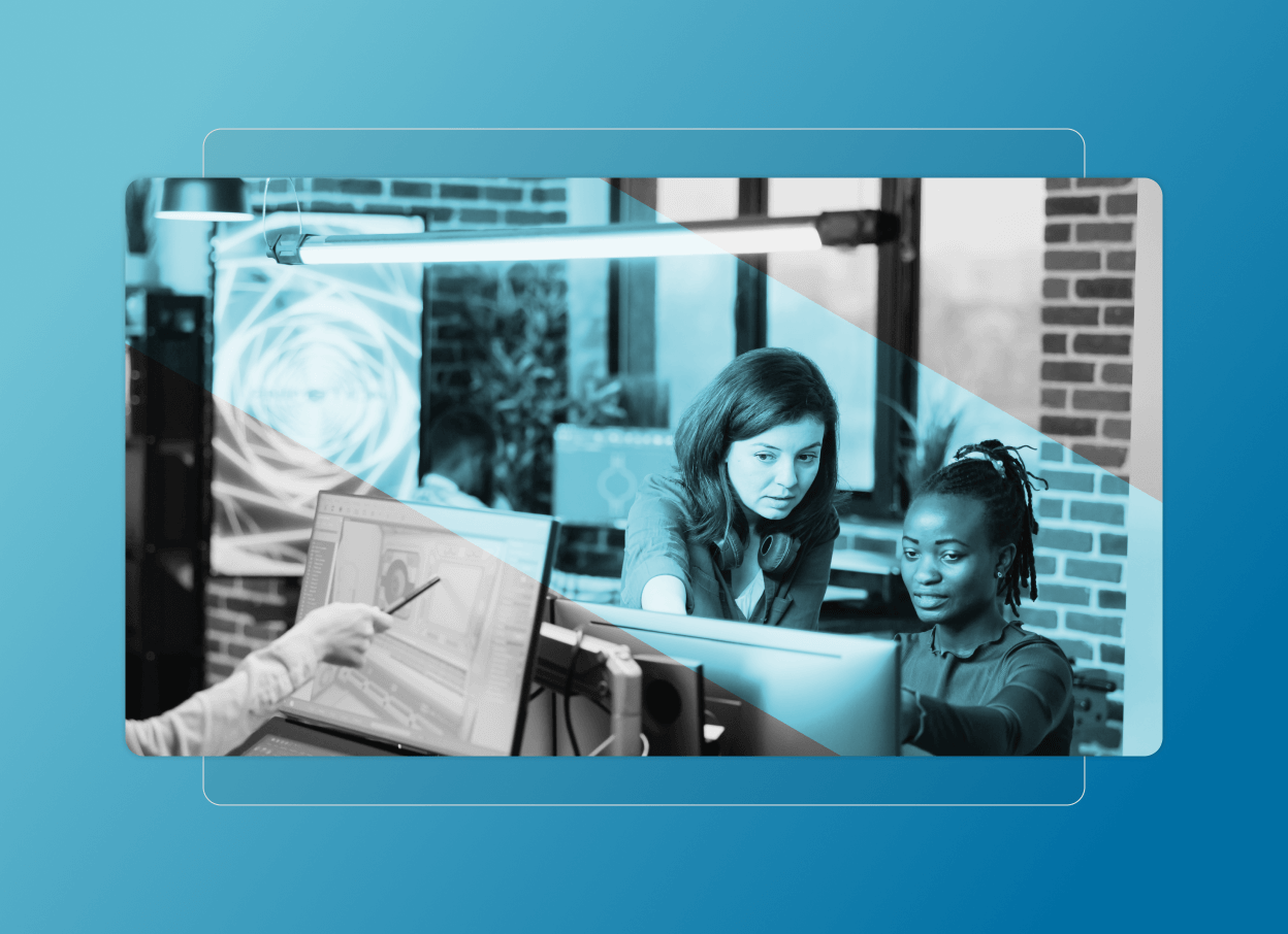 Two women collaborate at a computer in a modern office with brick walls, discussing a Cloud Accordion Section. In the foreground, a third person points to another screen. Blue overlay effect on image highlights their focus on Quality Accordion features.