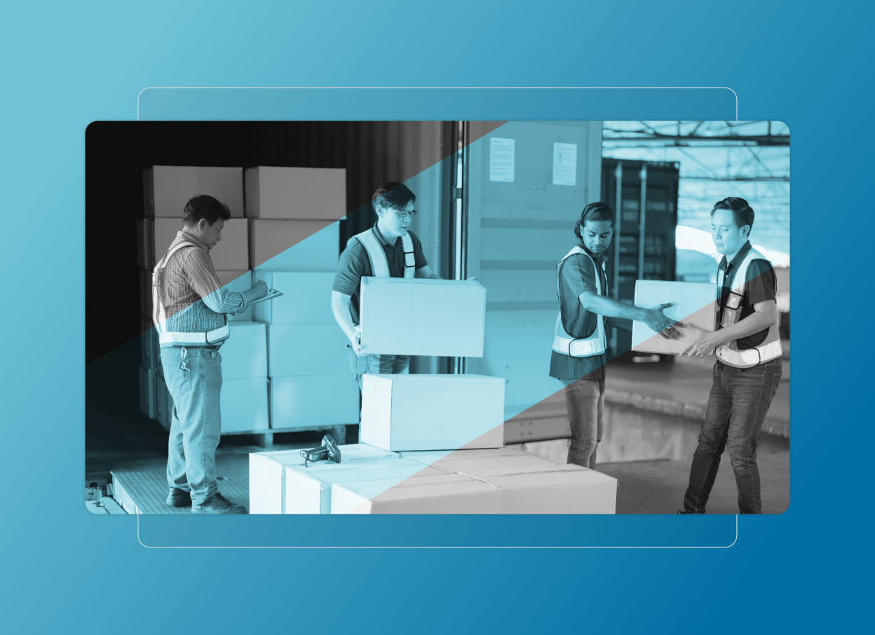 Four warehouse workers wearing safety vests load and organize cardboard boxes near a shipping container. One person with a clipboard checks the list, ensuring Quality Cloud Accordion in operations. Blue overlay effect applied.
