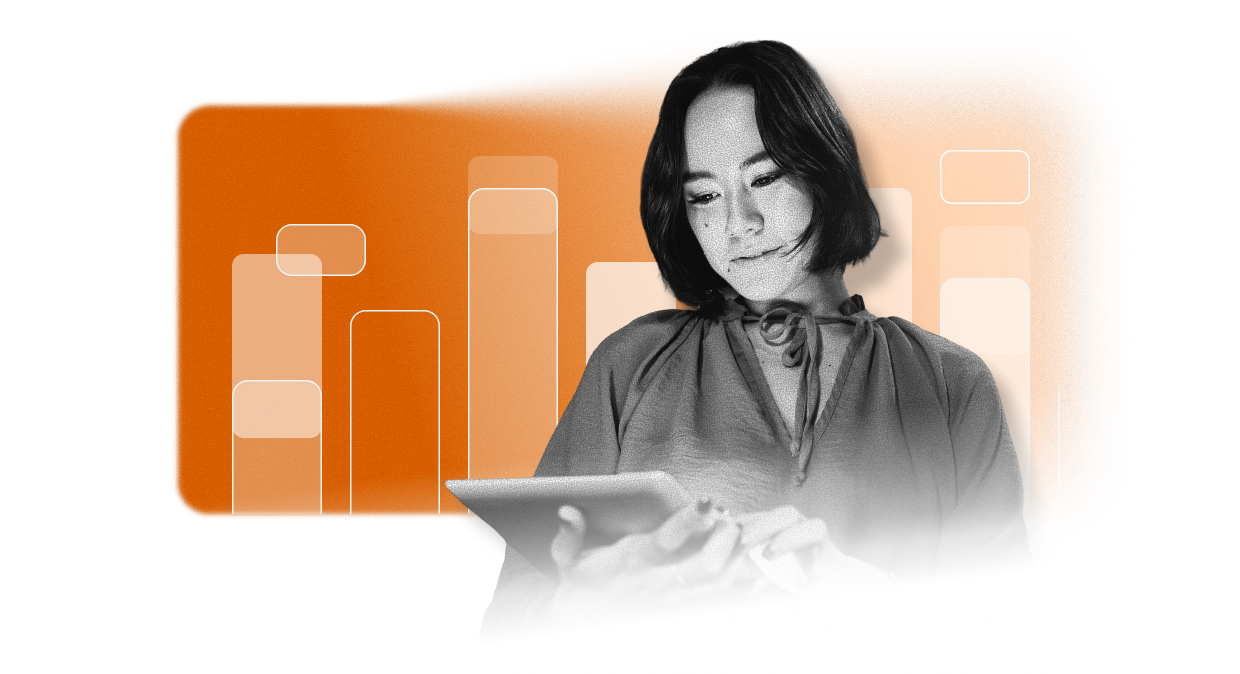 A woman with short dark hair looks at a tablet, with abstract orange and white bar chart graphics—reflecting the power of an EHS Software Platform—in the background.
