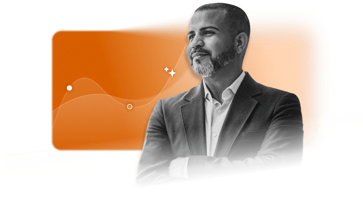 A man in a suit with arms crossed looks confidently to the side, set against an orange abstract background with subtle lines and dots, symbolizing leadership in EHS Software Platform solutions.